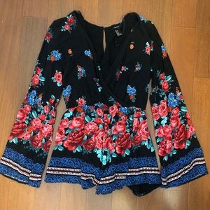 Cute bell sleeved floral Romper